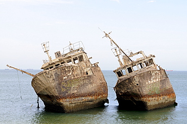 Ship wrecks rusting on the beach of Nouadhibou, one of the largest ship wreck cemeteries worldwide, Mauretania, northwestern Africa