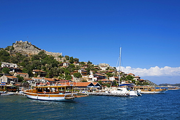 Castle and scenic restaurant, Kale, Simena, Lycia, southern coast of Turkey, Western Asia