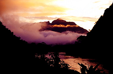 Misty mountains and river in the early morning, northern Laos, Asia