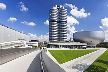 BMW Tower with the BMW Museum on Mittleren Ring, the central ring road near the Olympic Centre, Munich, Upper Bavaria, Bavaria, Germany, Europe