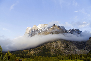 Low clouds on the Wetterhorn mountain, Grindelwald, Bernese Oberland region, canton of Bern, Switzerland, Europe