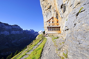 The Aescher mountain restaurant near the Wildkirchli caves below the Ebenalp cliff, Canton Appenzell Inner Rhodes, Switzerland, Europe