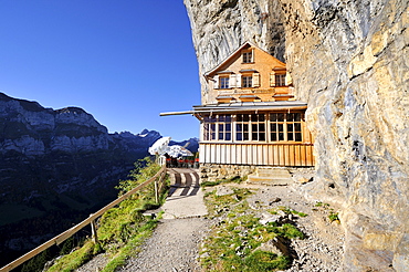 The Aescher mountain restaurant near the Wildkirchli caves below the Ebenalp cliff, Canton Appenzell Inner Rhodes, Switzerland, Europe