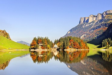 View from the west over Seealp Lake, at 1143 m altitude, towards Forelle mountain guesthouse, Canton of Appenzell Inner-Rhodes, Switzerland, Europe