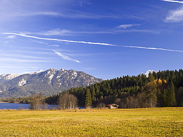 Barmsee lake with pastures and hay hut, Bavaria, Germany, Europe