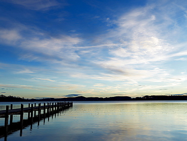 Sunrise at a jetty on lake Woerthsee, Bavaria, Germany, Europe