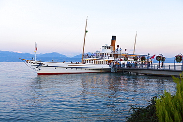 Old paddle-steamer as a ferry for tourists, docked at a wharf near Morges, Canton of Vaud, Lake Geneva, Switzerland, Europe