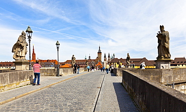 Alte Mainbruecke Main river bridge, overlooking the city hall and the Cathedral of St. Kilian, Wuerzburg, Bavaria, Germany, Europe