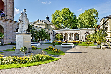 Pensioners in the Kurgarten Cafe, a cafe in a spa garden of the Kurhaus spa hotel with the Regentenbau building and arcade halls, Bad Kissingen, Lower Franconia, Bavaria, Germany, Europe