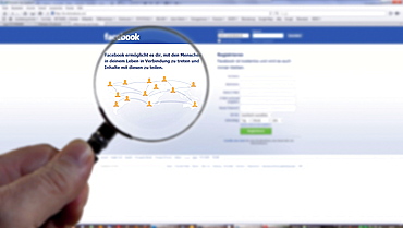 Searching for information on Facebook with a magnifying glass