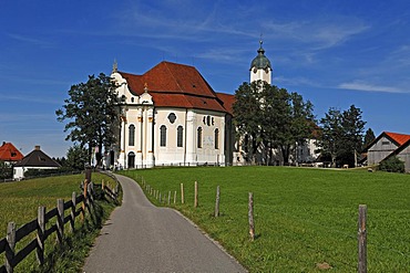 Pilgrimage Church of Wies with pastures and a blue sky, Wies 12, Steingaden, Upper Bavaria, Bavaria, Germany, Europe