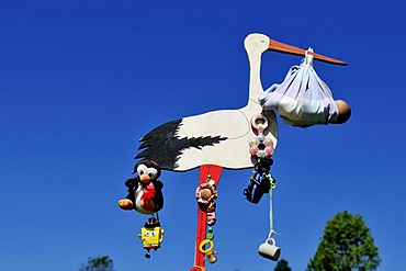 Stork showing the birth of a child, local custom, Reit im Winkl, Bavaria, Germany, Europe