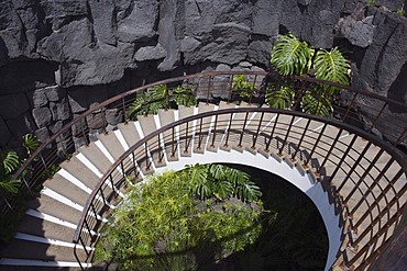 Circular staircase leading down into a lava cave, Casa Museo al Campesino, PeasantÂ¥s House Museum, Mozaga, Lanzarote, Canary Islands, Spain, Europe