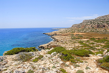 Rock coast, cliffs and blue sea, Cap Gkreko, Cape Greco in Ayia Napa, Southern Cyprus, Republic of Cyprus, the Mediterranean, Europe