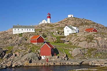 Wooden houses and lighthouse at Lindesnes, the most Southern point of Norway, Scandinavia, Europe