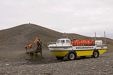 Amphibious vehicle in Jokulsarlon glacial lagoon, South coast, Iceland, Europe