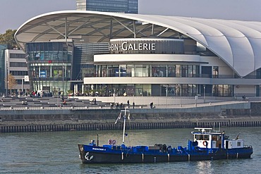 Boat on the Rhine and Rhein-Galerie shopping centre, Ludwigshafen am Rhein, Rhineland-Palatinate, Germany, Europe