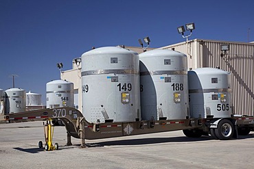 Radioactive plutonium and americium waste from America's nuclear weapons program in TRUPACT shipping containers at the Waste Isolation Pilot Plant; nuclear waste is shipped by truck from all over the country to be stored in rooms carved out of an ancient 