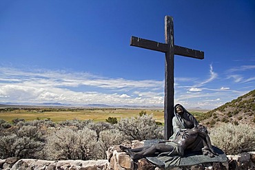 The Shrine of the Stations of the Cross, sculptures by artist Huberto Maestas, on a hill above town, San Luis, Colorado, USA