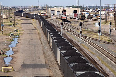 An eastbound train hauling coal from western strip mines passes through the Union Pacific Railroad's Bailey Yard, the largest rail yard in the world which handles 14, 000 rail cars every day, North Platte, Nebraska, USA