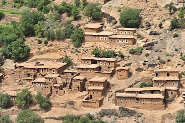 Typical Berber village with traditional adobe houses and small kasbahs in the mountains of the High Atlas, Morocco, Africa