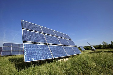 Solar panels mounted on so called Movers, moving in circles around their axes with the movement of the sun, Gut Erlasee Solar Park, Arnstein, Bavaria, Germany, Europe