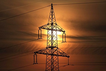 Electricity pylon at sunrise