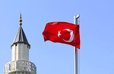 Turkish national flag in front of the minaret of Haci Bayram Mosque, Talhaus, Hockenheim, Baden-Wuerttemberg, Germany, Europe