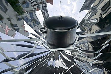 Cooking pot on a solar collector, cooking with solar energy, Germany, Europe