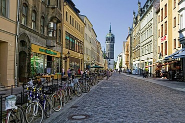 Coswiner Strasse Street and Schlosskirche Church, Lutherstadt Wittenberg, Saxony-Anhalt, Germany, Europe