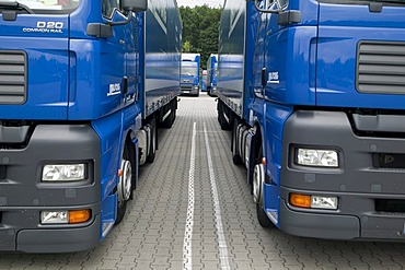 Parked trucks of a forwarding agent, haulier at the weekend in Germany, Europe