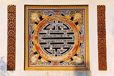 Window shaped like the Confucian symbol of luck, Hoang Thanh Royal Citadel, Hue, North Vietnam, Vietnam, Southeast Asia, Asia