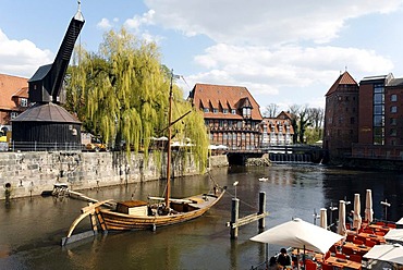 Historical salt port at the Ilmenau river, replica of a salt ship, old crane, old town, Lueneburg, Lower Saxony, Germany, Europe