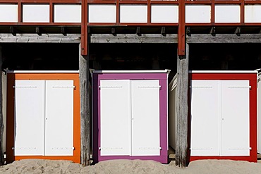 Three coloured beach huts with white doors, Westkapelle, Walcheren peninsula, Zeeland province, Netherlands, Benelux, Europe