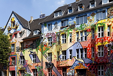 Kiefernstrasse street, houses of former squatters, artistically painted facades in street art style, Duesseldorf-Flingern, North Rhine-Westphalia, Germany, Europe