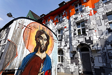 Jesus graffiti on on-site trailer and houses of former squatters, artistically painted facades in street art style, Kiefernstrasse, Duesseldorf-Flingern, North Rhine-Westphalia, Germany, Europe