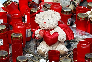 Teddy between candles to remember the victims of the crowd crush at the Loveparade 2010, Duisburg, North Rhine-Westphalia, Germany, Europe