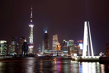 Illuminated skyline at night, Pudong, Shanghai, China, Asia