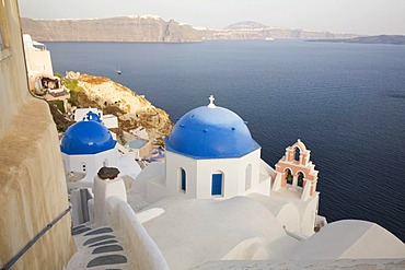 Church with blue cupolas, Oia, Santorini, Cyclades, Greece, Europe