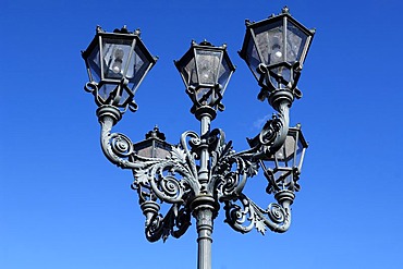 Old five-armed cast-iron decorative lantern against blue sky, Rhena, Mecklenburg-Western Pomerania, Germany, Europe