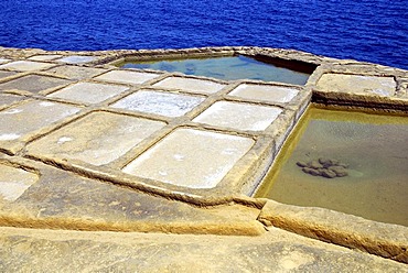 Salt works, rocky coast with salines, Xwejni Bay, Marsalforn, Gozo Island, Republic of Malta, Mediterranean Sea, Europe