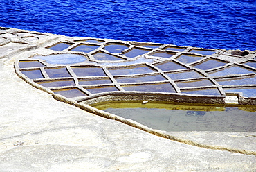 Salt works, rocky coast with salines, Xwejni Bay, Marsalforn, Gozo Island, Republic of Malta, Mediterranean Sea, Europe