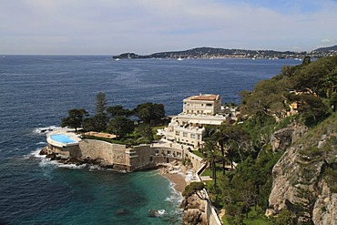 View on Saint-Jean-Cap-Ferrat, a villa with a swimming pool by the sea, Alpes Maritimes department, Provence-Alpes-Cote d'Azur region, France, Mediterranean Sea, Europe