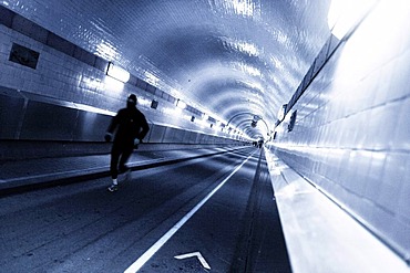 Jogger in the old Elbe Tunnel, Hamburg, Germany, Europe