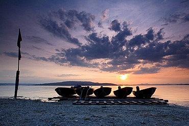 Boats in the evening light with sunset at Sandseele on Reichenau island,