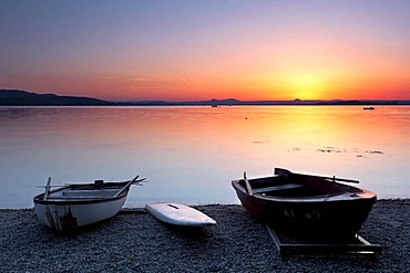 Boats on the lakeshore in the evening light after sunset, Reichenau Island, Lake Constance, Baden-Wuerttemberg, Germany, Europe