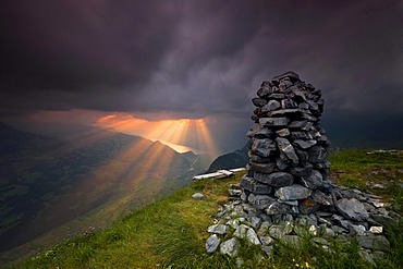 Cairn, pile of stones, sunset, the Alps, Alvier mountain range, Toggenburg valley, Switzerland, Europe