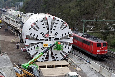 A giant tunnel boring machine of the specialist firm Herrenknecht, length 90 meters, bore diameter more than 10 meters, in front of the construction site of the second tube of the Kaiser Wilhelm Tunnel at the Ediger-Eller district, Rhineland-Palatinate, G