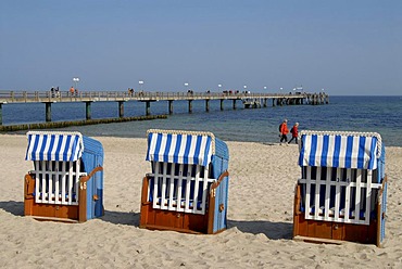 Beach chairs and pier on the beach of Kuehlungsborn on the Baltic Sea, Mecklenburg-Western Pomerania, Germany, Europe