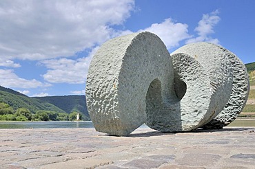 "Poseidon" sculpture made of Anroecht dolomit created by the artist Jo Kley, located where the Nahe river flows into the Rhine river, Maeuseturm tower at the back, Upper Middle Rhine Valley UNESCO World Heritage site, Bingen, Rhineland-Palatinate, Germany